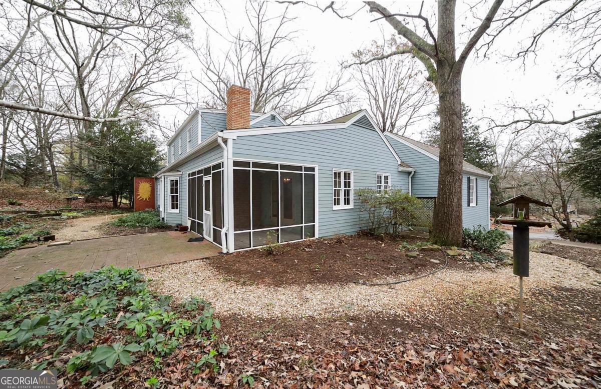 158 Lakeover Drive Athens, GA 30607 - Photo 41 of 48 a view of a house with a yard covered in snow