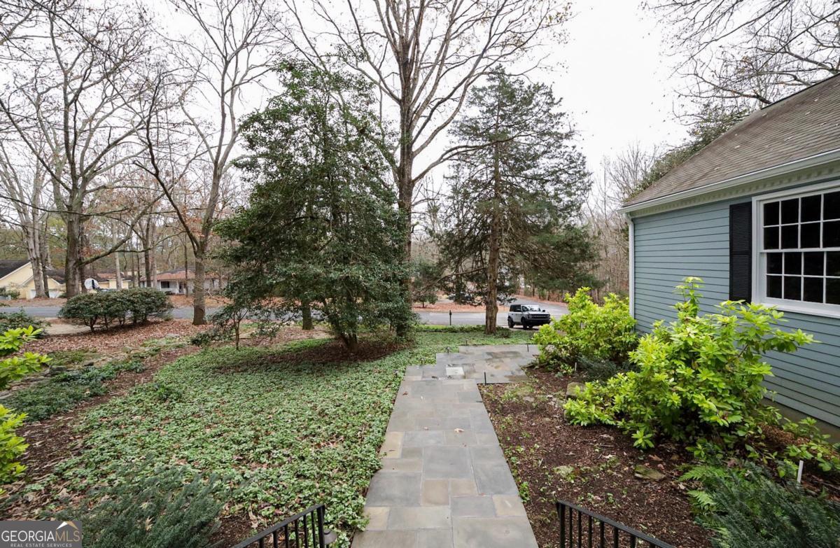 158 Lakeover Drive Athens, GA 30607 - Photo 43 of 48 a view of a pathway with a house in the background