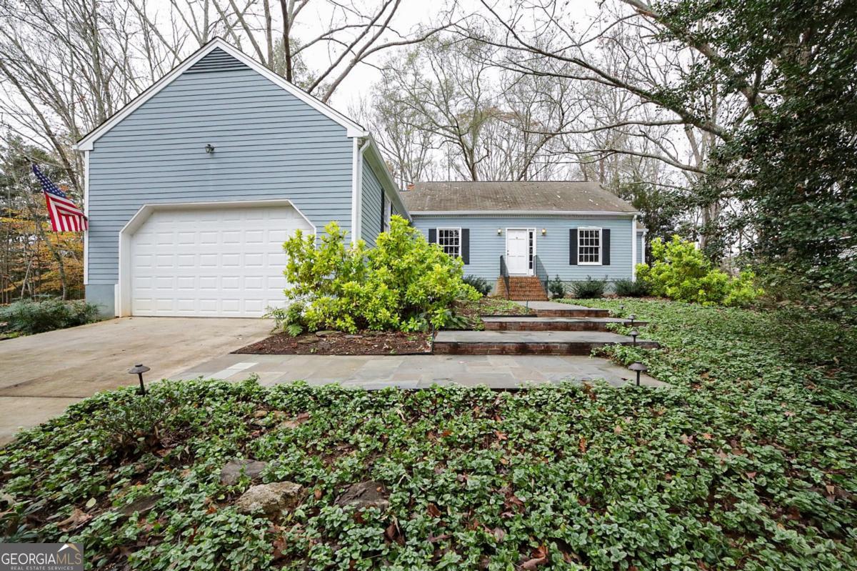 158 Lakeover Drive Athens, GA 30607 - Photo 47 of 48 a front view of a house with garden