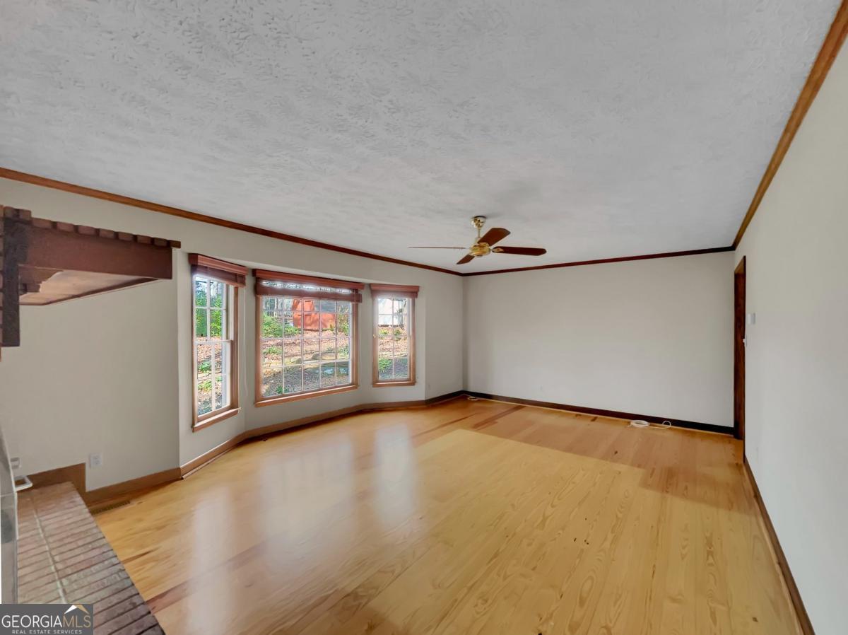 158 Lakeover Drive Athens, GA 30607 - Photo 8 of 48 a view of an empty room with a window