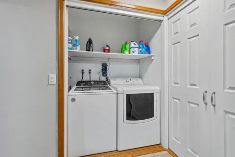 a utility room with dryer and washer