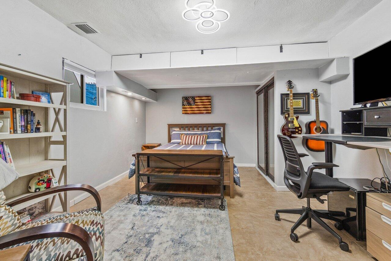 5131 Northeast 27th Terrace Lighthouse Point, FL 33064 - Photo 21 of 39 a view of a workspace with furniture