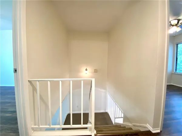 a view of entryway with wooden floor