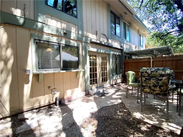 a view of a building with sitting area