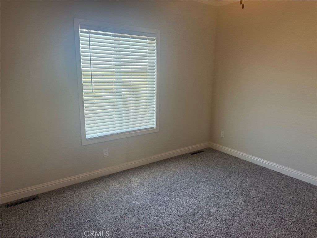 14450 Meridian Road Chico, CA 95973 - Photo 6 of 37 an empty room with a window