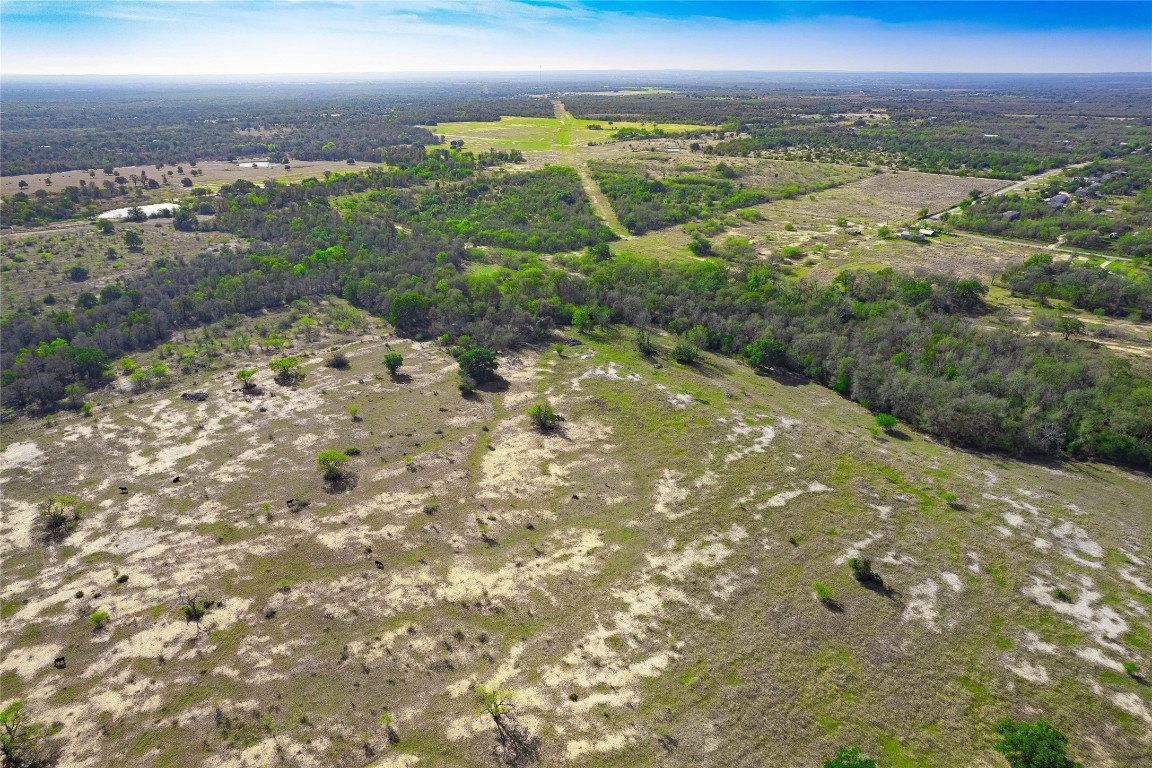 1180 Bugtussle Lane Luling, TX 78648 - Photo 16 of 19 a view of an outdoor space with mountain view