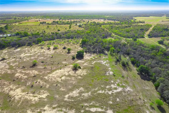 $395,000 | 1180 Bugtussle Lane, Luling, TX 78648