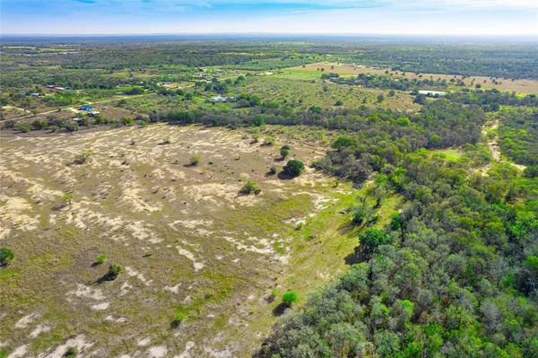 $395,000 | 1180 Bugtussle Lane, Luling, TX 78648