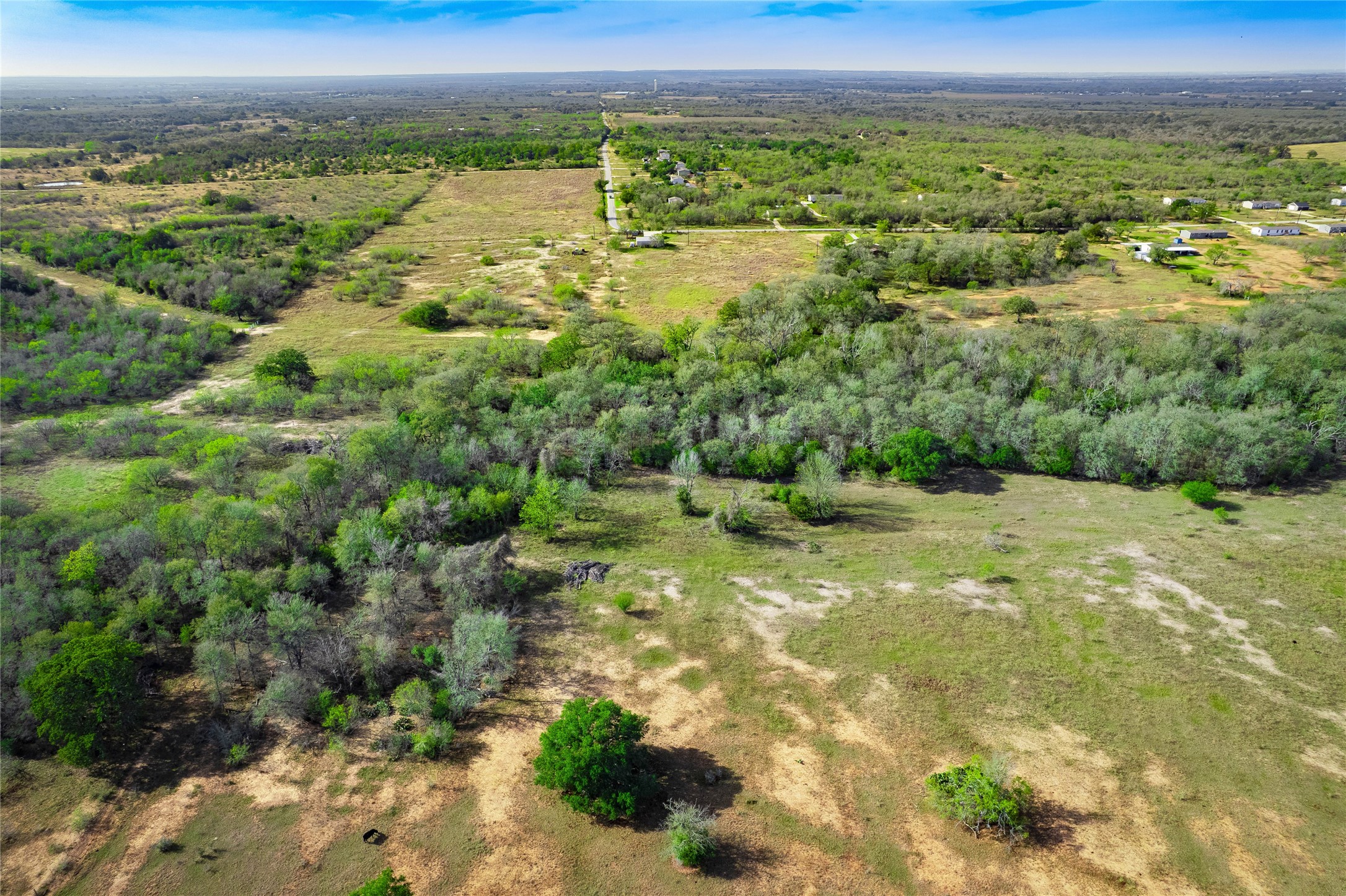1180 Bugtussle Lane Luling, TX 78648 - Photo 8 of 21 a view of a garden with an outdoor space