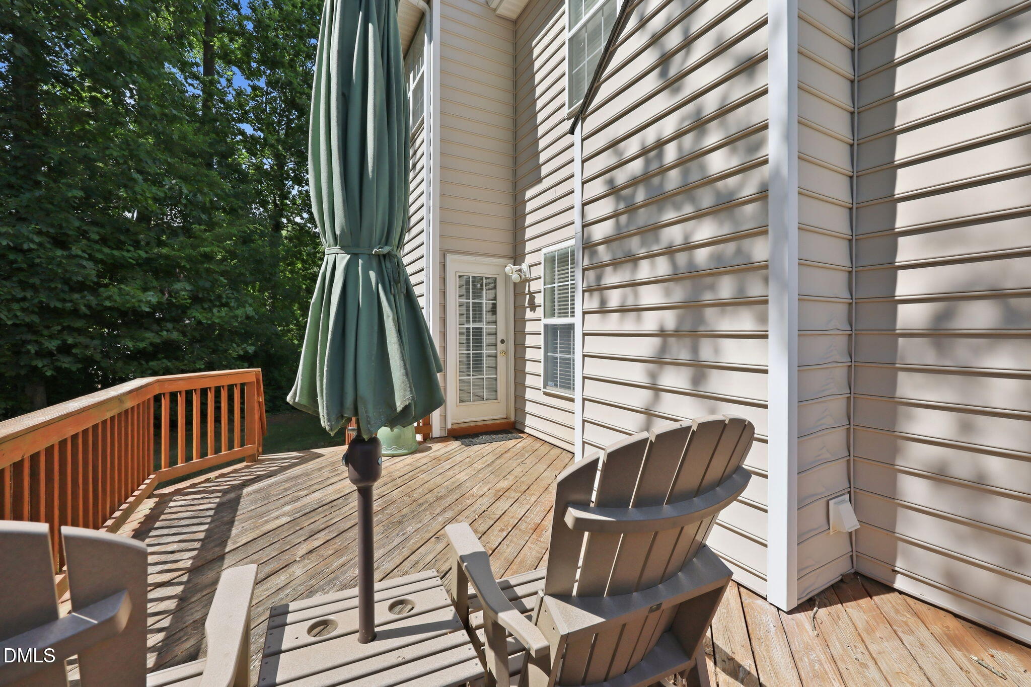 9105 Willow Valley Court Raleigh, NC 27617 - Photo 34 of 51 a view of balcony with wooden floor and outdoor seating