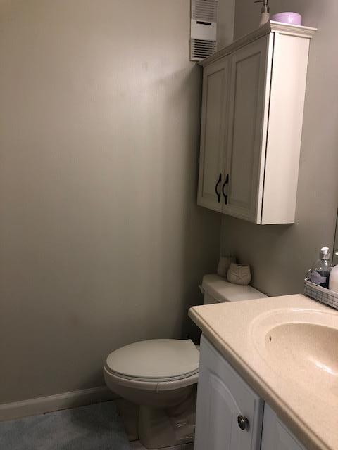 63 Sandy Lane, Unit 102 Santa Rosa Beach, FL 32459 - Photo 16 of 26 a bathroom with a sink and a toilet