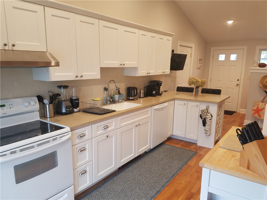 1312 Wapping Road Middletown, RI 02842 - Photo 12 of 42 Eat in kitchen/Back Door /Mud room and Garage Entry