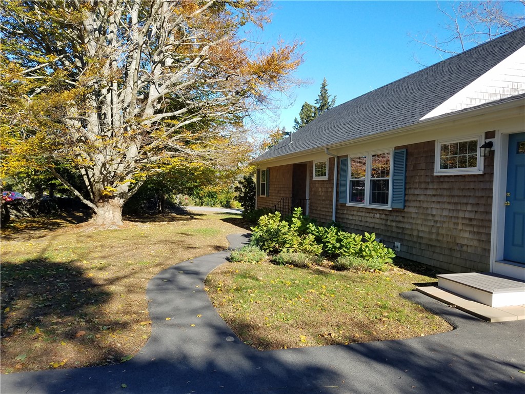 1312 Wapping Road Middletown, RI 02842 - Photo 38 of 42 Side View to Walkway to Front Door & Yard