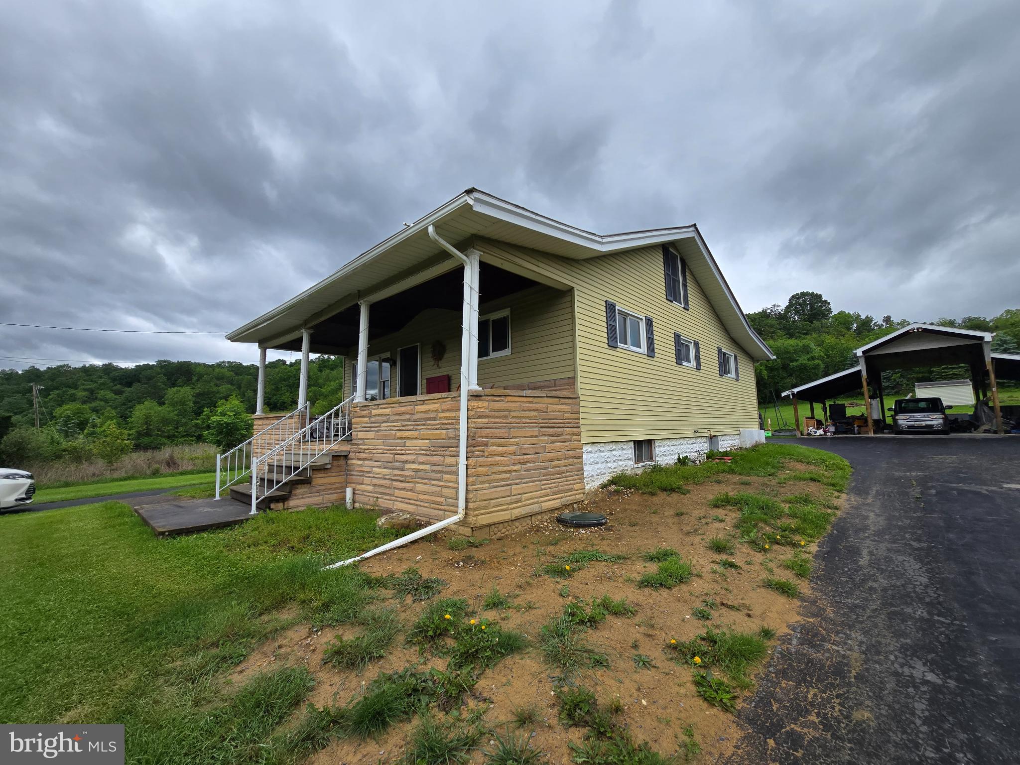 11825 Mason Road Northeast Cumberland, MD 21502 - Photo 26 of 26 Charming home nestled in lush greenery.