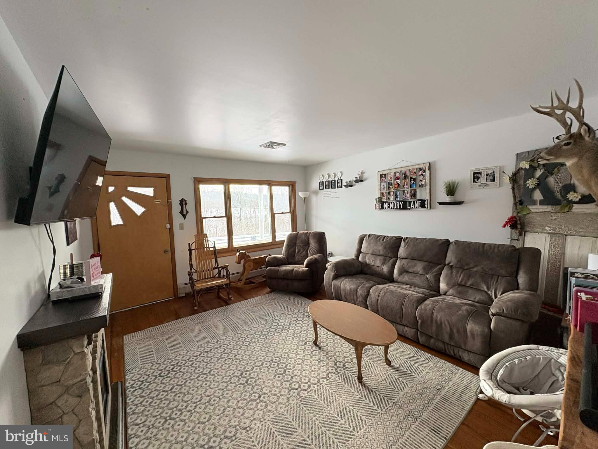 11825 Mason Road Northeast Cumberland, MD 21502 - Photo 3 of 26 Cozy living space with natural light.