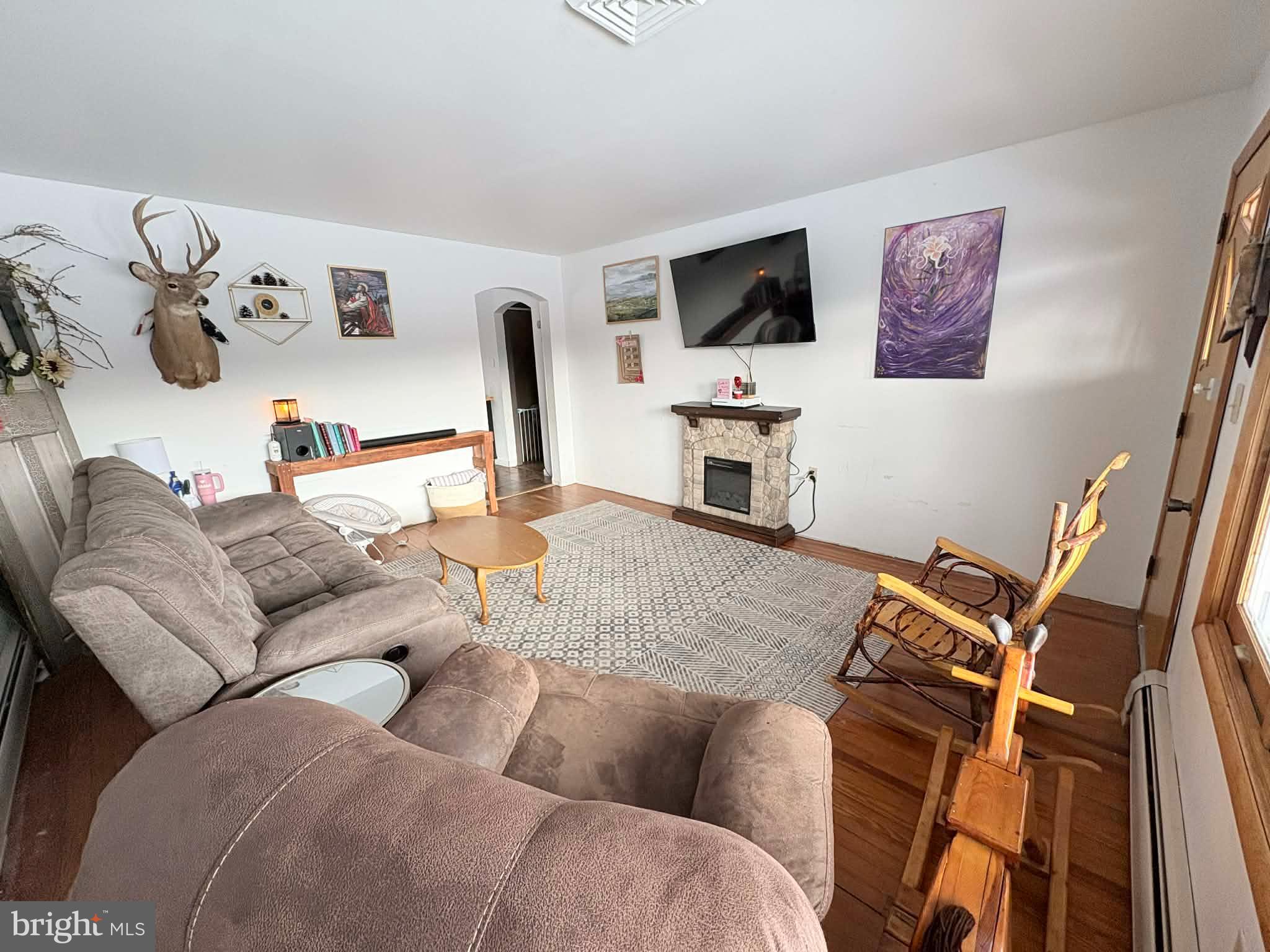 11825 Mason Road Northeast Cumberland, MD 21502 - Photo 4 of 26 Cozy living space with rustic charm.