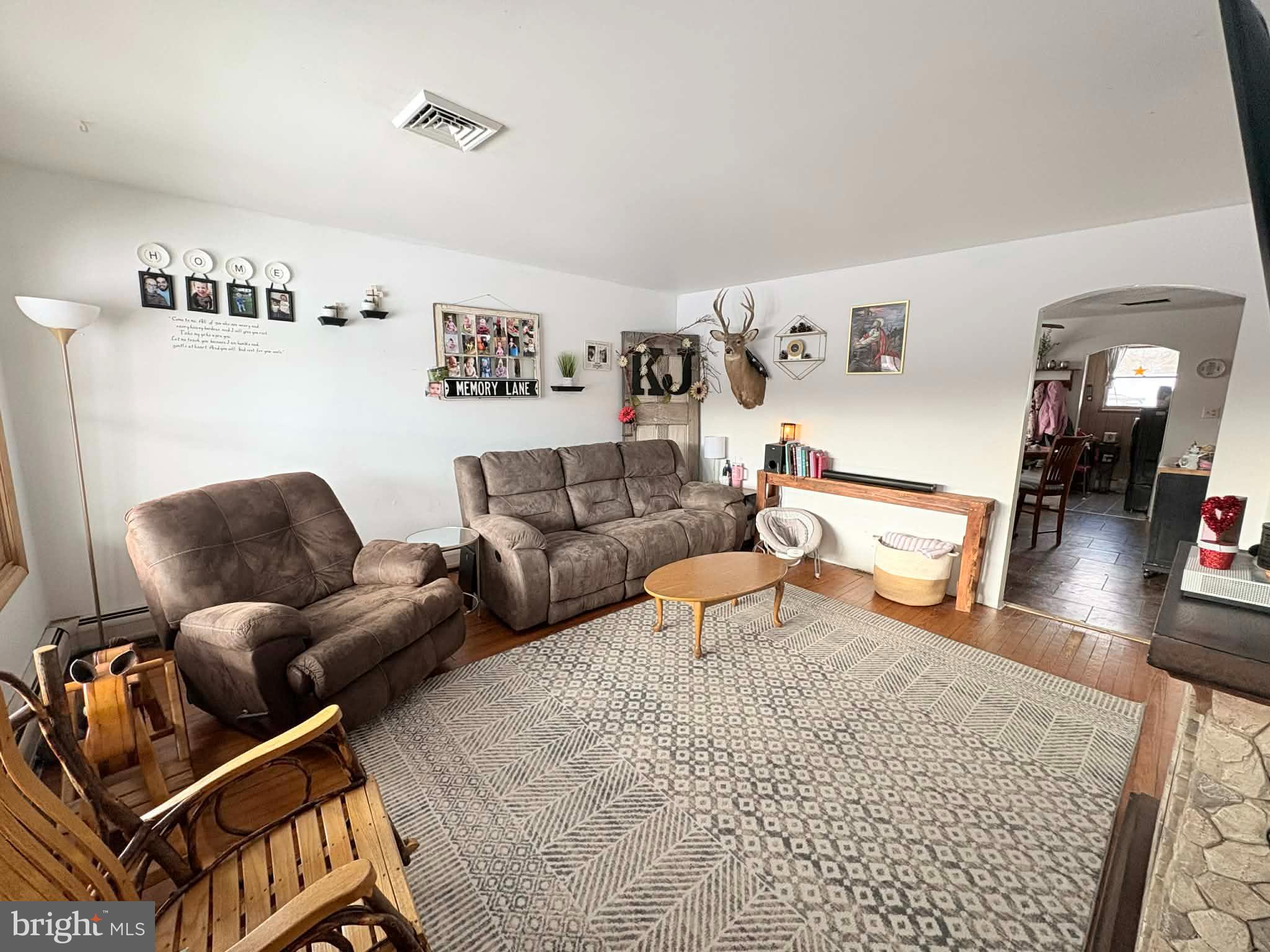 11825 Mason Road Northeast Cumberland, MD 21502 - Photo 5 of 26 Cozy living space with rustic charm.