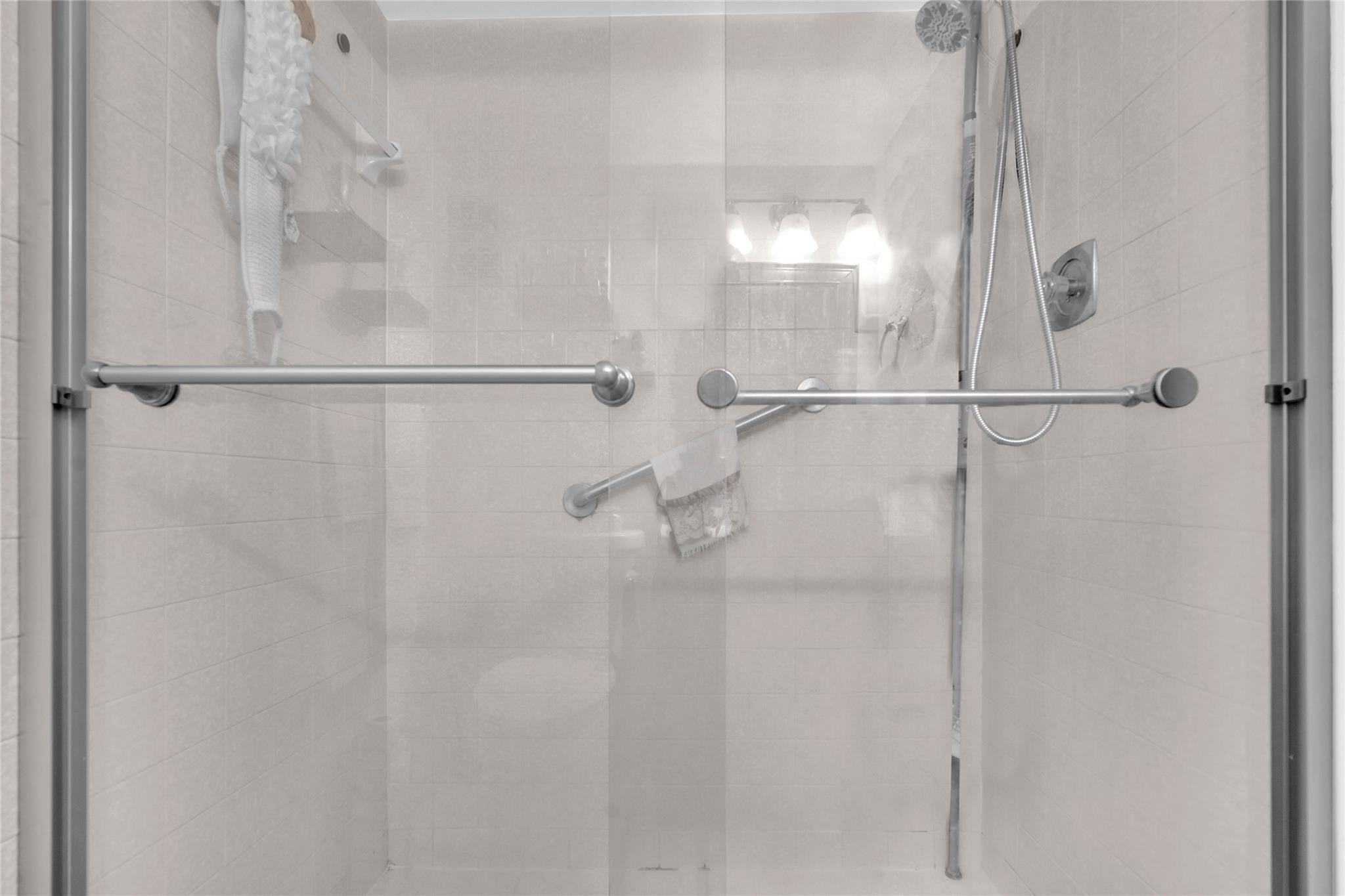 3910 Inverrary Boulevard, Unit 308B Lauderhill, FL 33319 - Photo 20 of 53 a bathroom with a shower