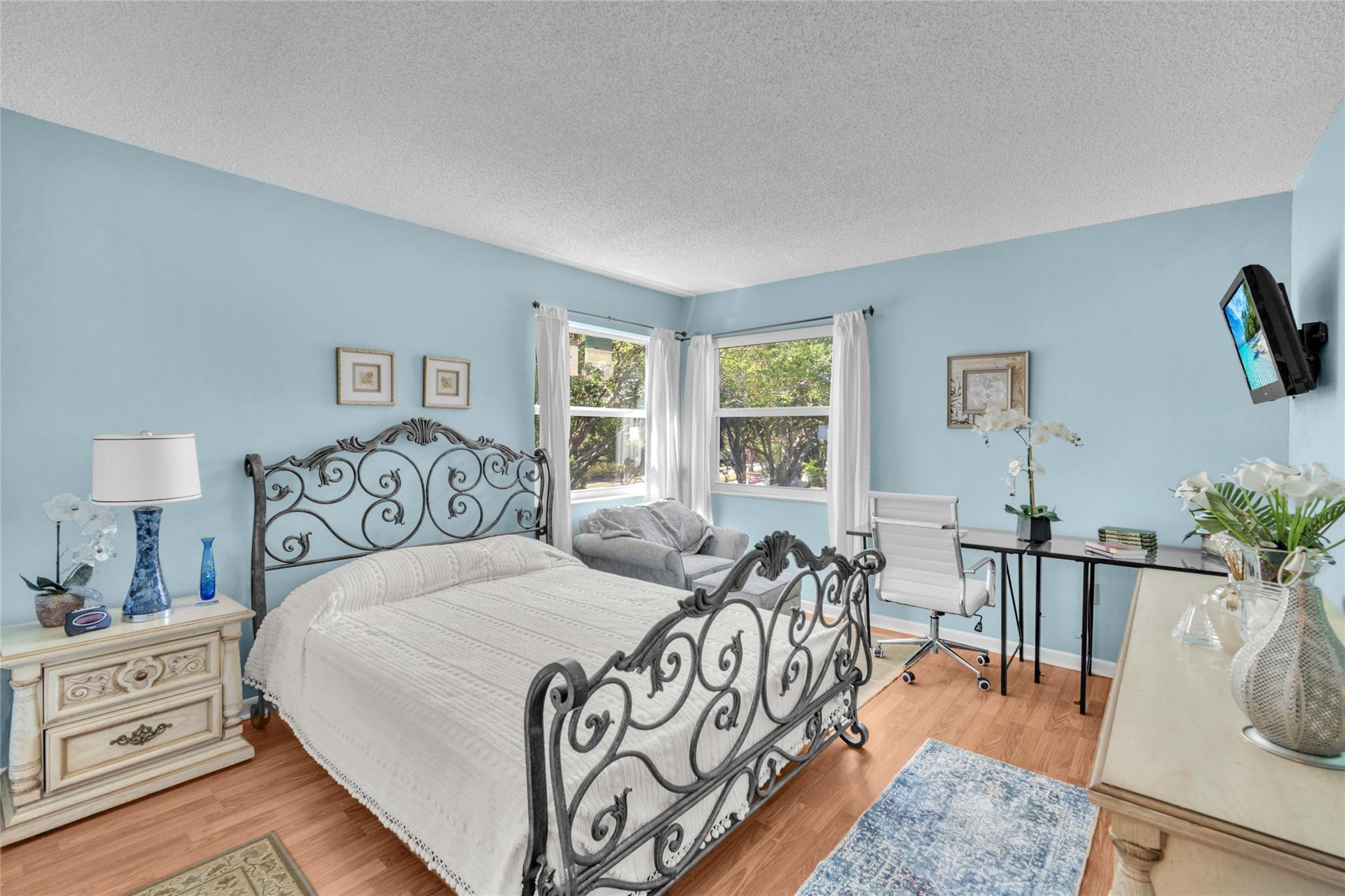 3910 Inverrary Boulevard, Unit 308B Lauderhill, FL 33319 - Photo 22 of 53 a bedroom with furniture and windows