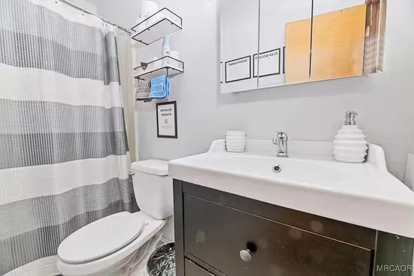 a view of a chairs and table on the deck