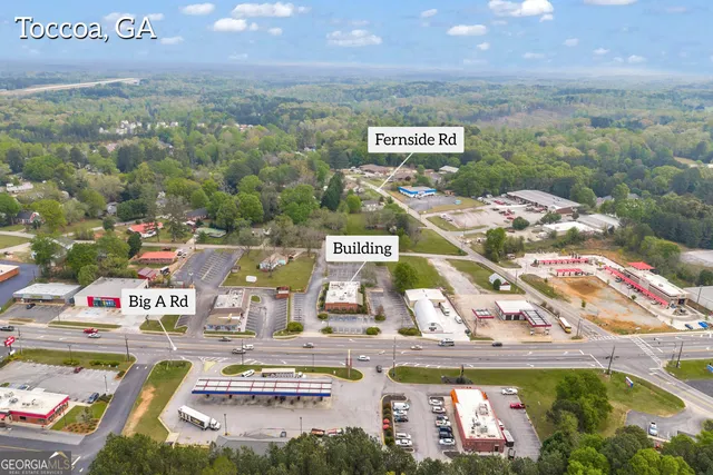 a very nice looking dining room with a table and chairs