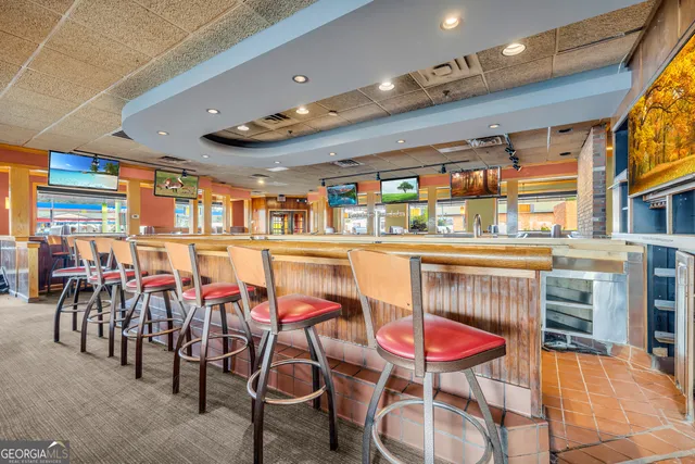 a kitchen with stainless steel appliances granite countertop lots of counter top space