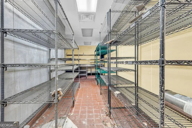 a view of yard from terrace with seating area