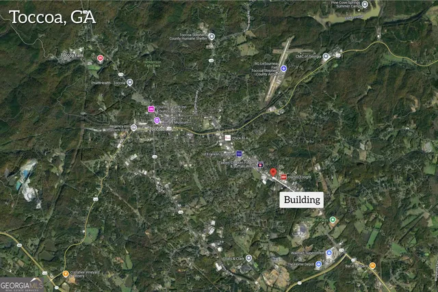 a view of a chair and tables in the house