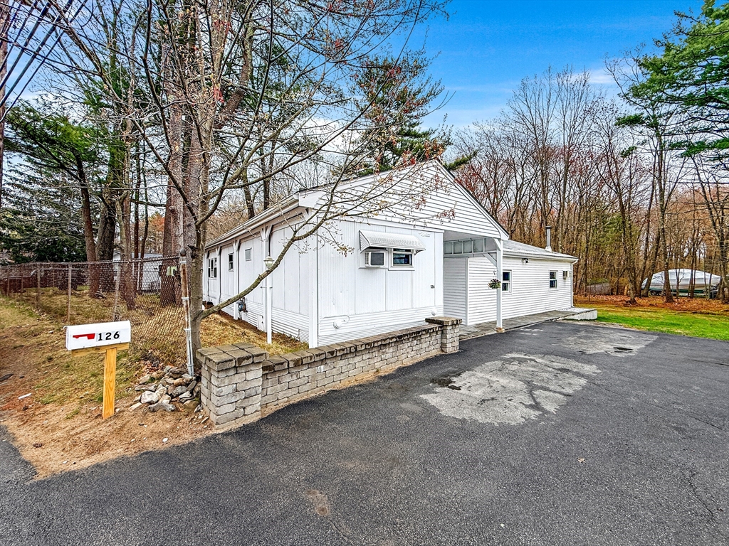 126 Beach Road Salisbury, MA 01952 - Photo 5 of 30 a view of a house with a yard