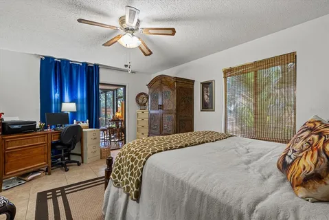 a bathroom with a shower and toilet