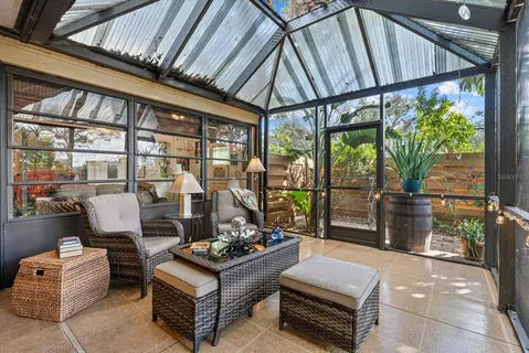 a very nice looking room with many glass windows