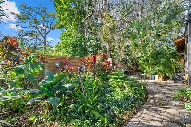 a backyard of a house with lots of green space