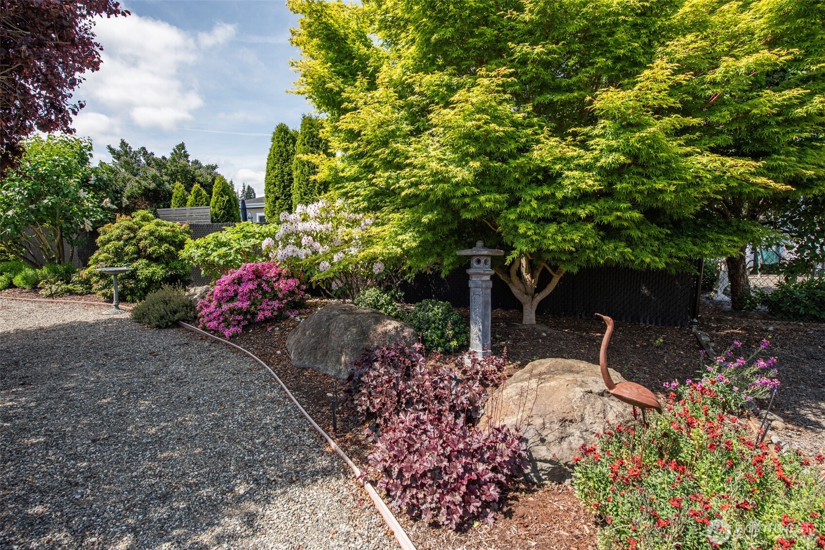 720 West Heritage Loop Sequim, WA 98382 - Photo 29 of 35 a wooden fence with some plants
