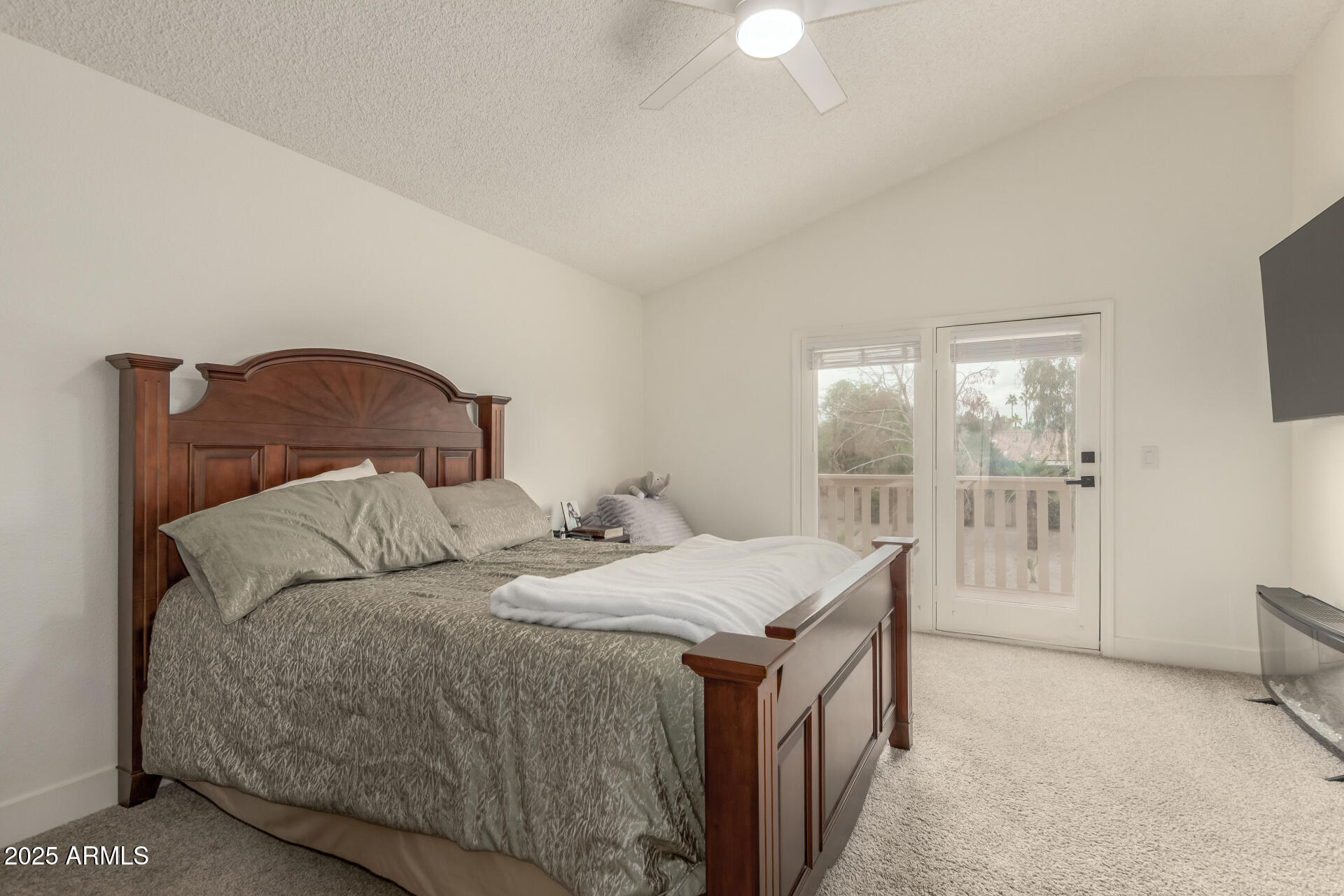 13042 South 42nd Street Phoenix, AZ 85044 - Photo 13 of 39 a bedroom with a bed and a window