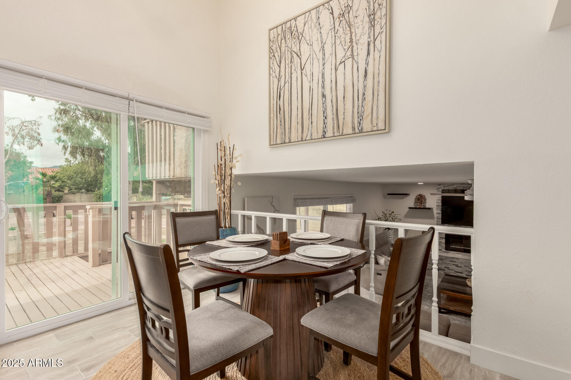 13042 South 42nd Street Phoenix, AZ 85044 - Photo 6 of 39 a view of a dining room with furniture and a window