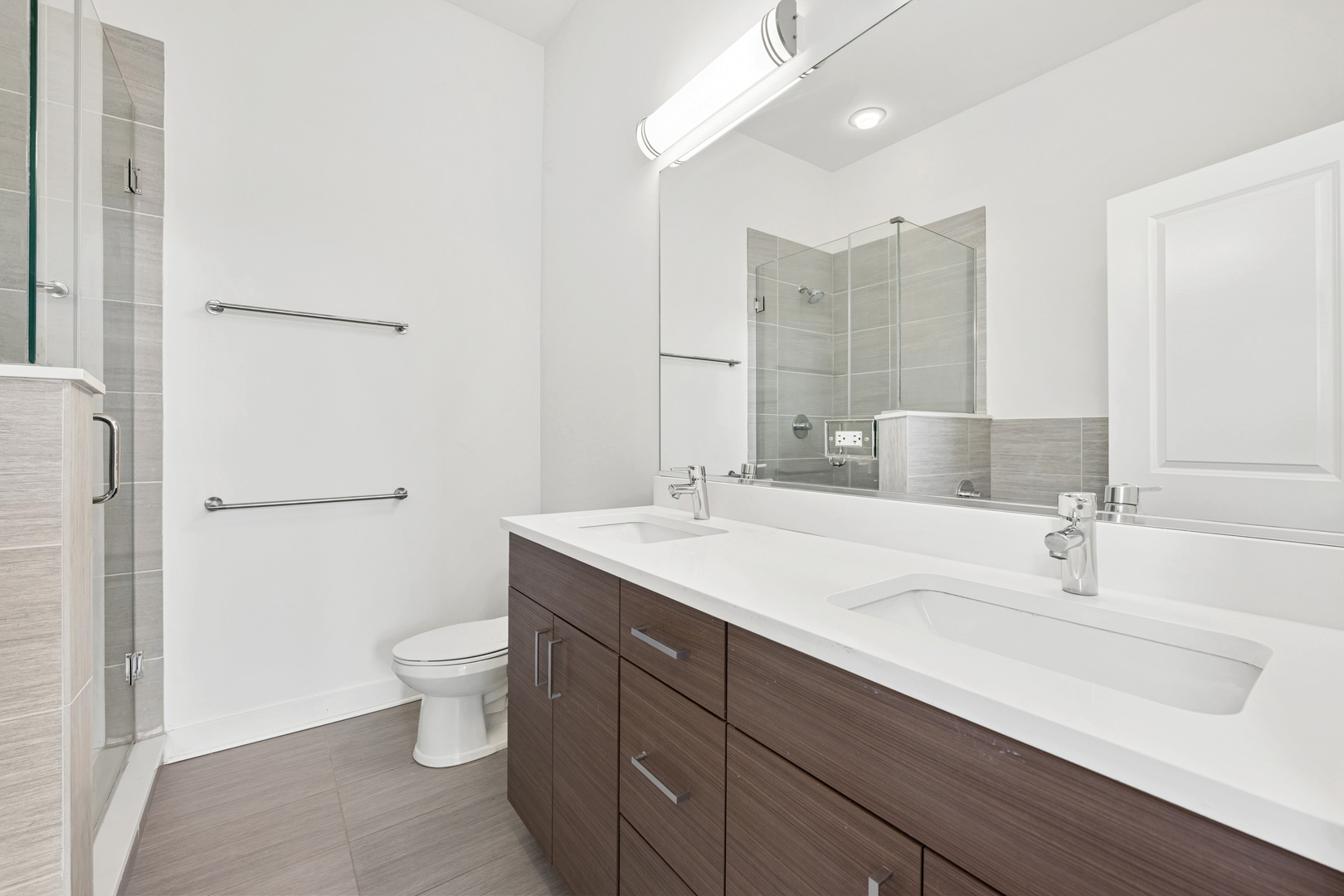 1952 West Ohio Street, Unit 3E Chicago, IL 60622 - Photo 18 of 27 a bathroom with a sink and a mirror
