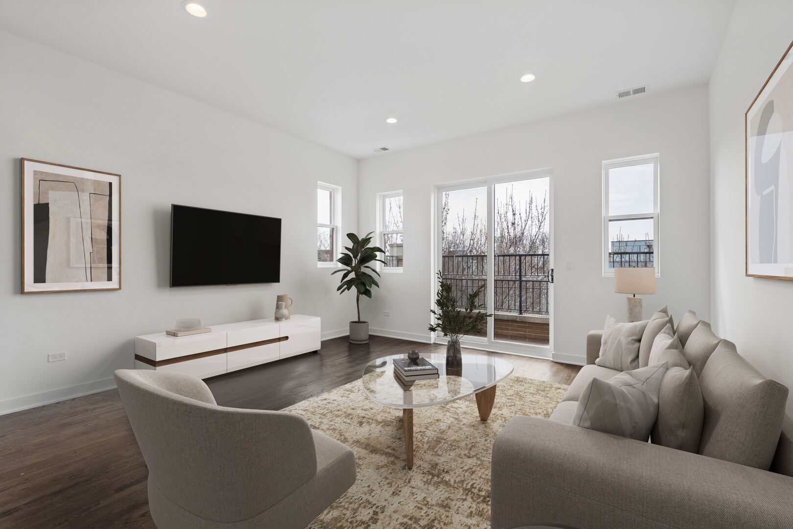1952 West Ohio Street, Unit 3E Chicago, IL 60622 - Photo 2 of 27 a living room with furniture and a flat screen tv