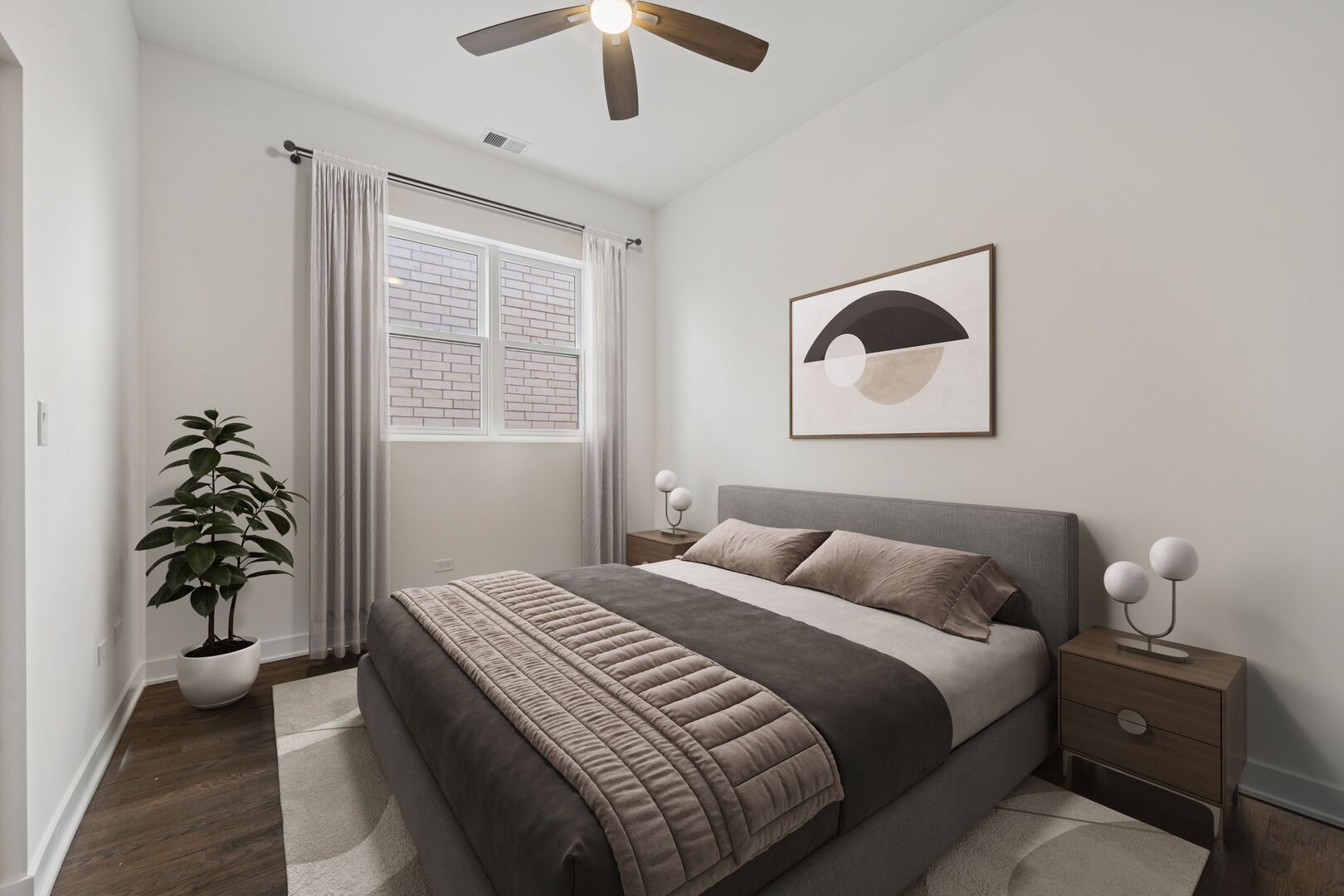 1952 West Ohio Street, Unit 3E Chicago, IL 60622 - Photo 22 of 27 a bedroom with a large bed and a potted plant
