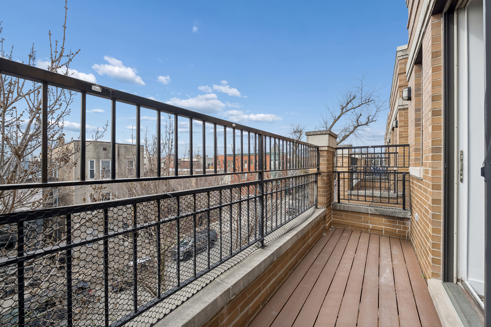 1952 West Ohio Street, Unit 3E Chicago, IL 60622 - Photo 27 of 27 a view of balcony with wooden floor