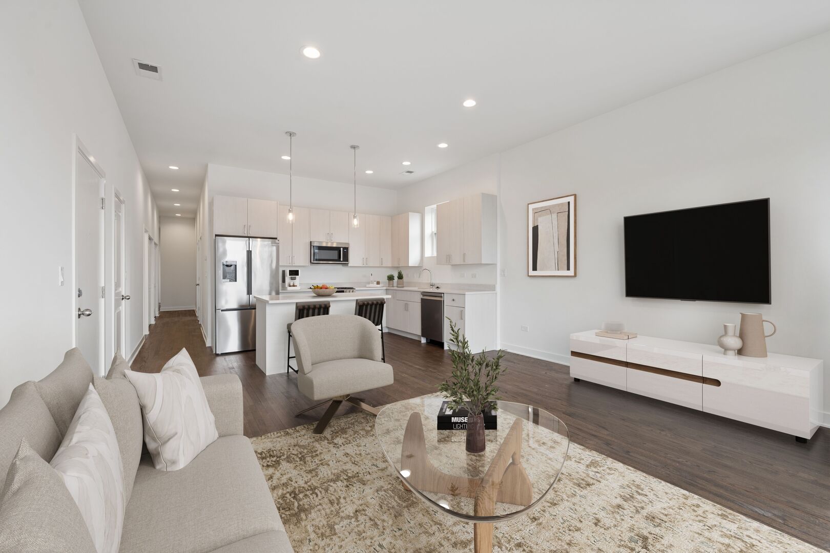 1952 West Ohio Street, Unit 3E Chicago, IL 60622 - Photo 5 of 27 a living room with furniture and a flat screen tv