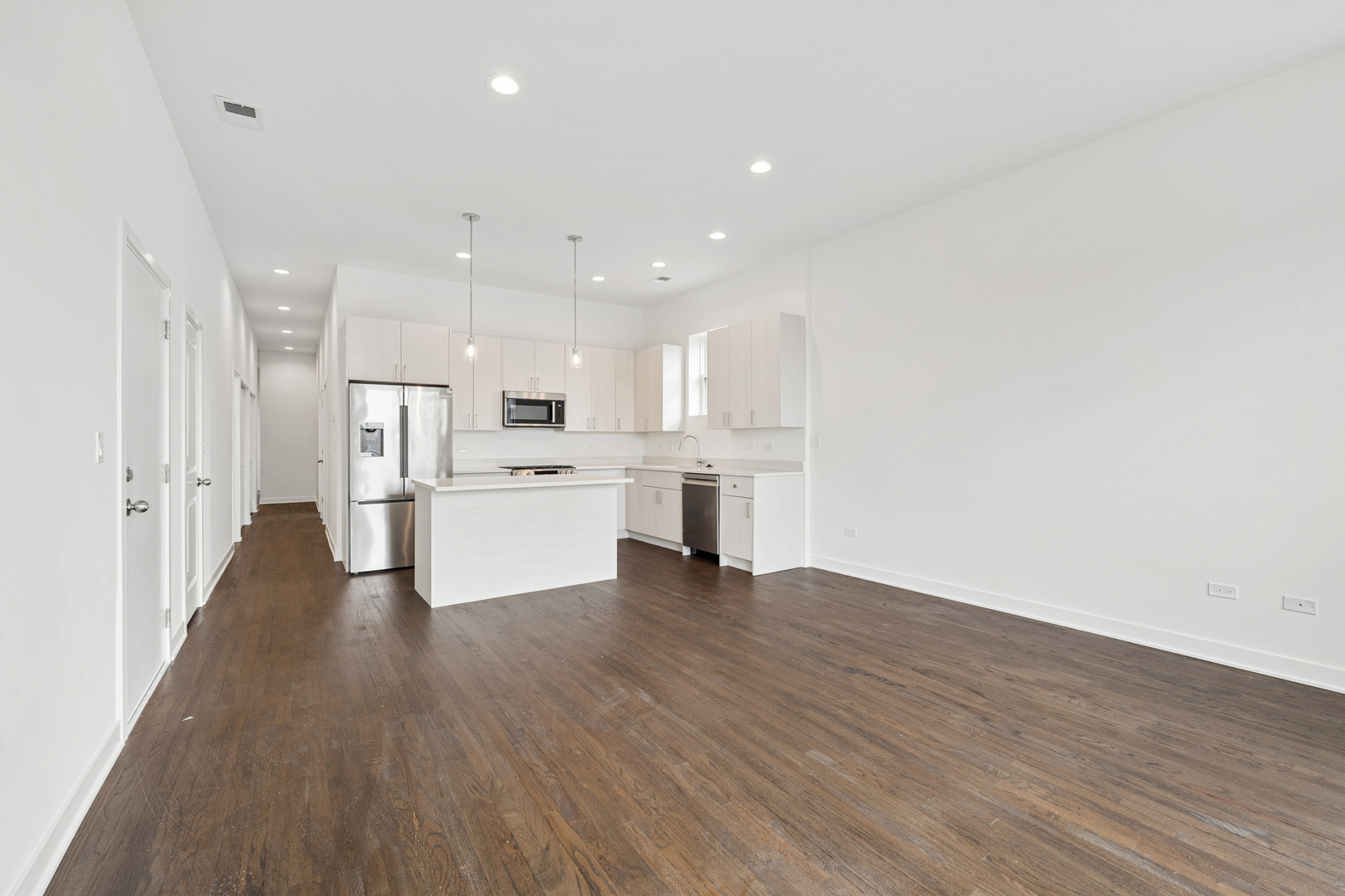 1952 West Ohio Street, Unit 3E Chicago, IL 60622 - Photo 7 of 27 a view of kitchen with wooden floor