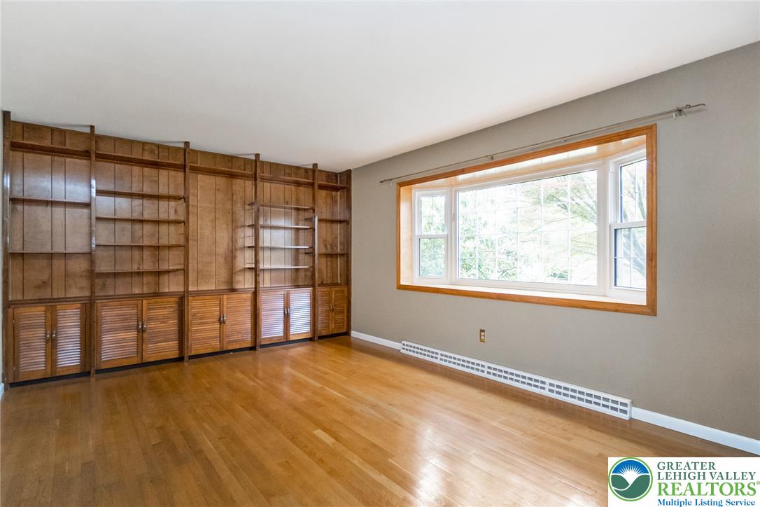 268 Apollo Drive Bethlehem, PA 18017 - Photo 6 of 56 Built-in shelving & cabinetry and ample natural light define this spacious living space.