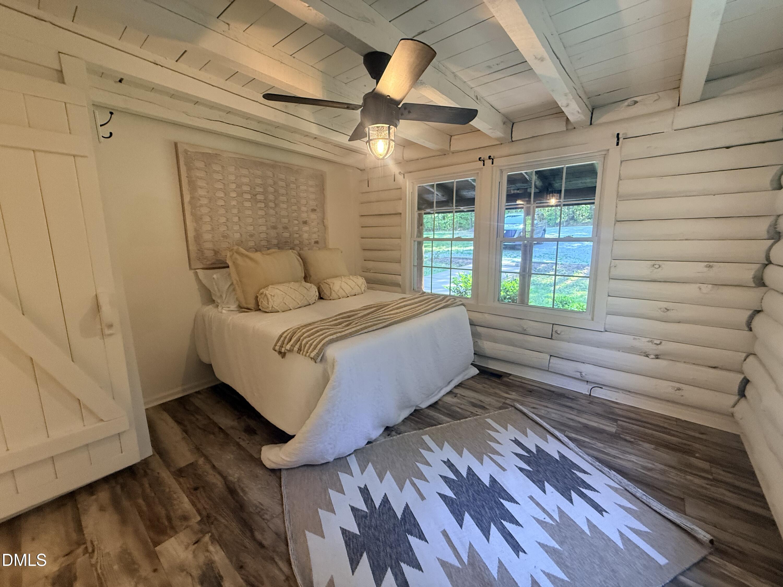327 Shady Oak Road Roxboro, NC 27574 - Photo 30 of 62 a bed room with a bed and a window