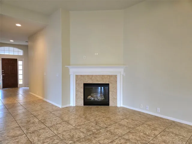 a kitchen with stainless steel appliances granite countertop a stove and a refrigerator