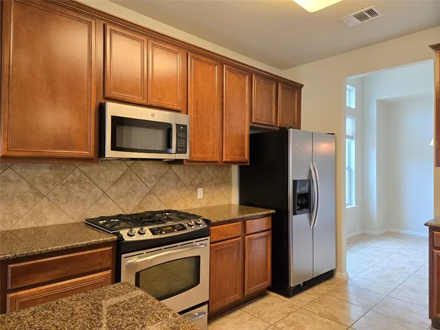 a bathroom with a sink double vanity and a mirror