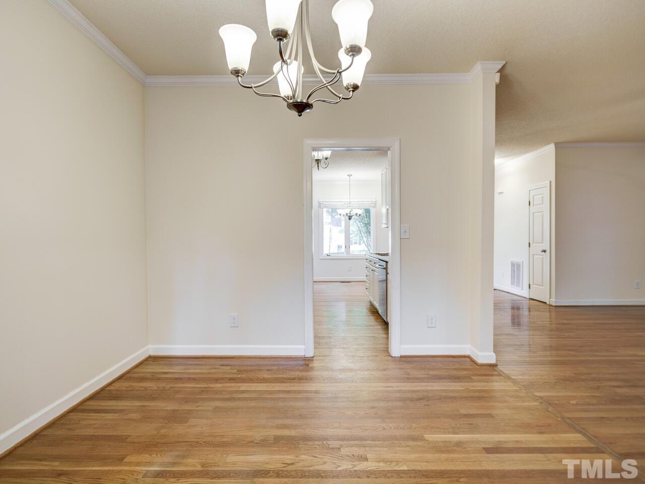 4121 Starboard Court Raleigh, NC 27613 - Photo 15 of 45 a view of a livingroom with wooden floor