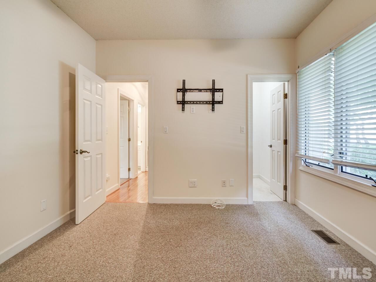 4121 Starboard Court Raleigh, NC 27613 - Photo 27 of 45 an empty room with windows and closet
