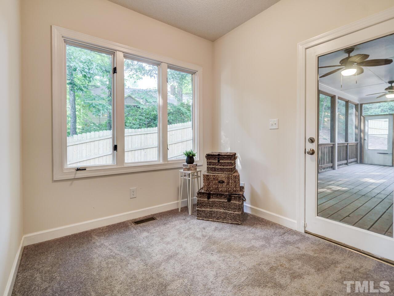 4121 Starboard Court Raleigh, NC 27613 - Photo 33 of 45 a view of room with furniture and windows