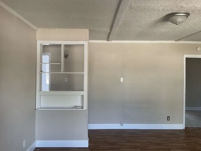 a view of an empty walk in closet