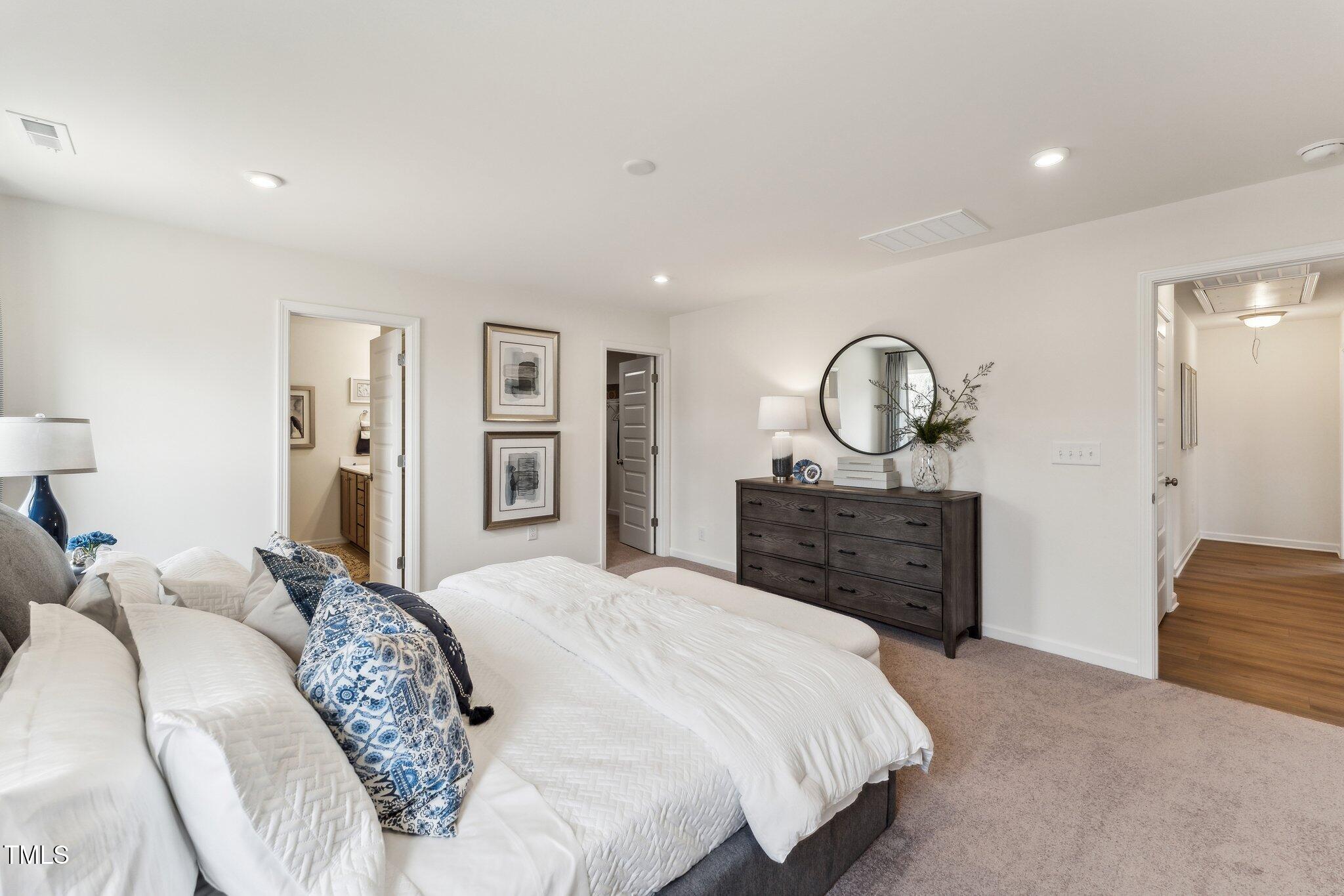 27 Cribbs Lane Middlesex, NC 27557 - Photo 27 of 41 a bedroom with a bed and a dresser